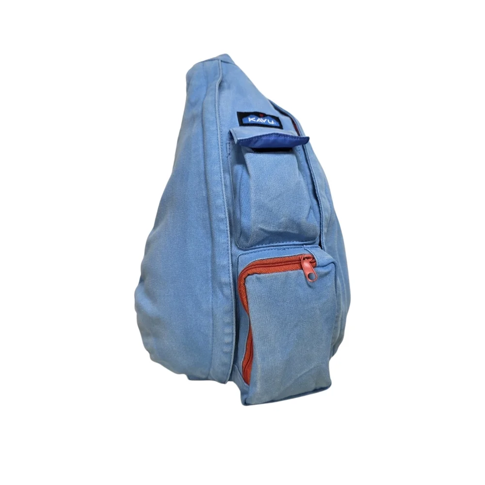 KAVU Denim Blue Sling Backpack with Orange Accents, Adjustable Rope Strap